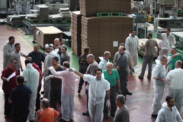 UNIPAK Management & Employees Work Together for a Clean Work Environment