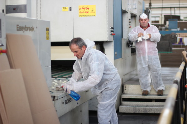 UNIPAK Management & Employees Work Together for a Clean Work Environment